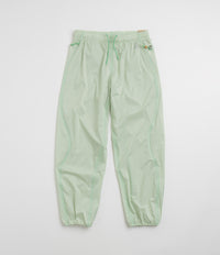 Nike ACG Trail Snacks Pants in Vapor Green and Reflective Silver