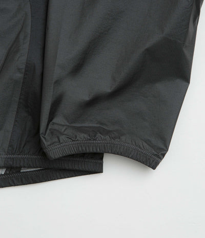 Nike ACG Trailwind Jacket in Anthracite and Summit White