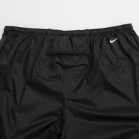 Nike ACG Trailwind Pants in Black and Summit White thumbnail