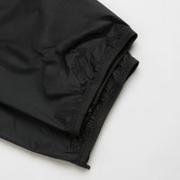 Nike ACG Trailwind Pants in Black and Summit White thumbnail