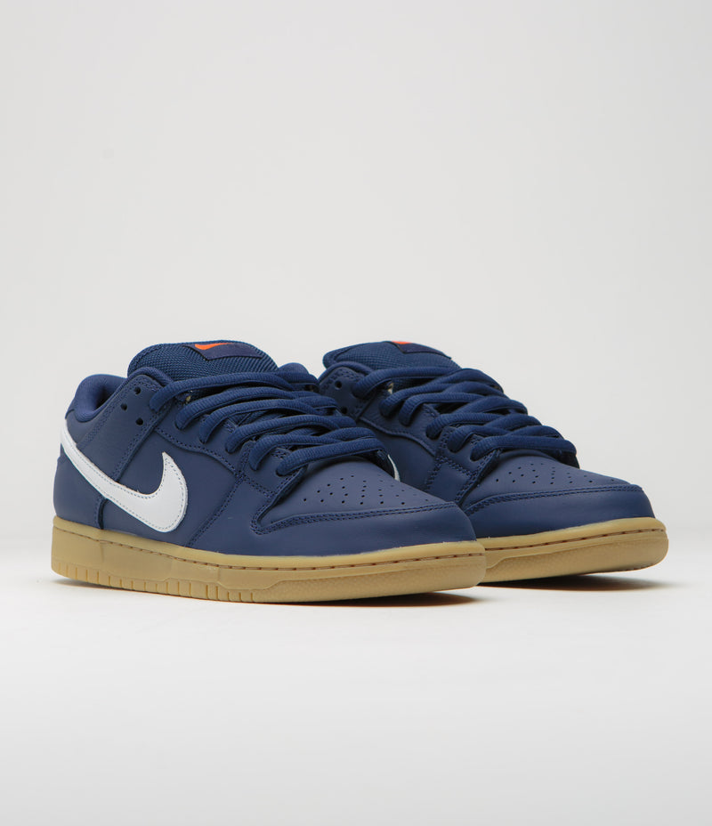 navy blue and orange nike shoes