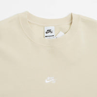 Nike SB Essential Logo Crewneck Sweatshirt in Light Khaki and White thumbnail