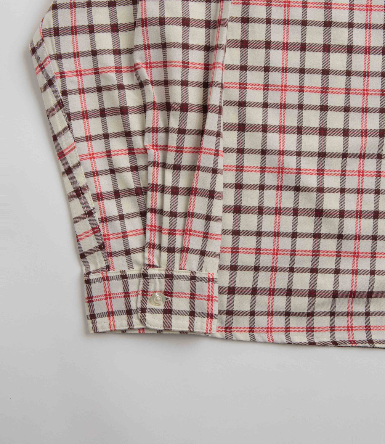White nike shirt deals with red check