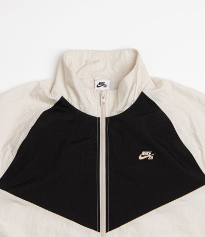 Nike SB Pavan Track Jacket - Light Orewood Brown / Black / Black / White