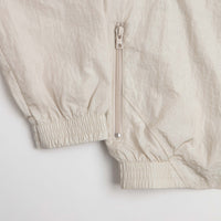 Nike SB Pavan Track Jacket - Light Orewood Brown / Black / Black / White thumbnail