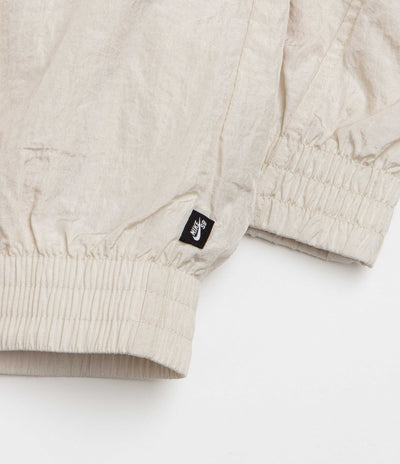 Nike SB Pavan Track Jacket - Light Orewood Brown / Black / Black / White