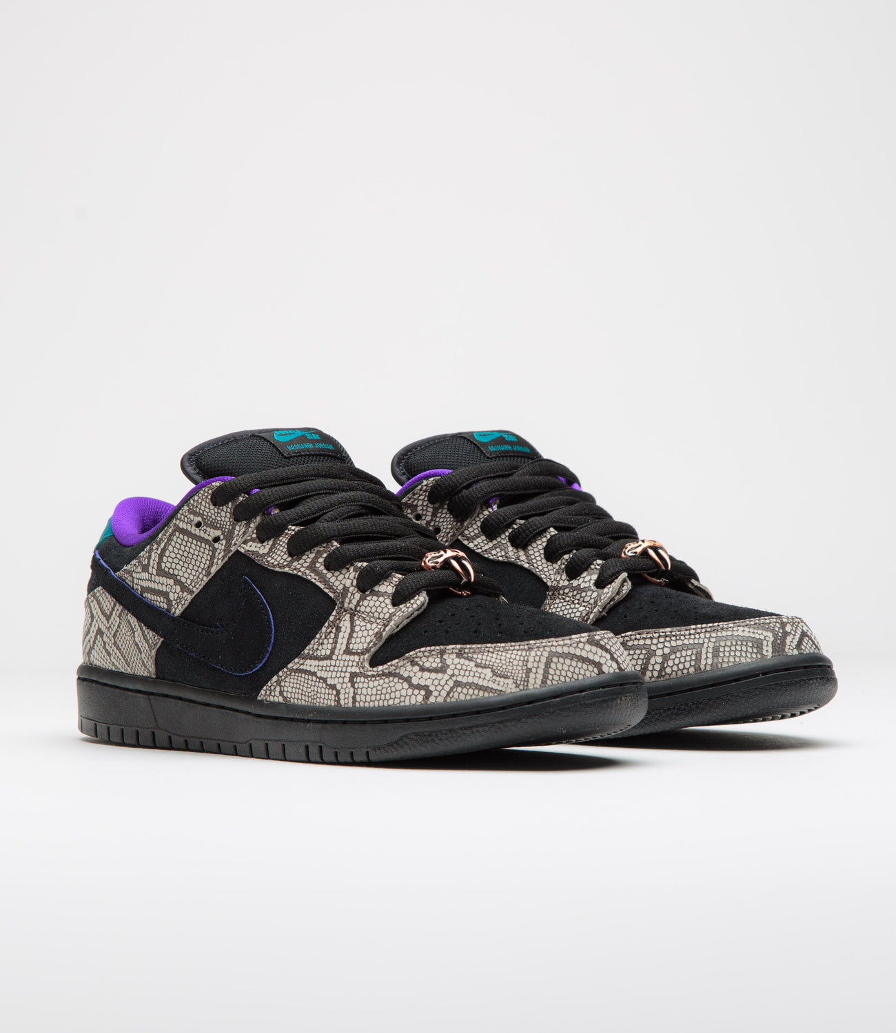 Nike SB Dunk Low Dashawn Jordan Bright Spruce IB6208-200 hero image showing snakeskin overlays and Turquoise and Purple colour details