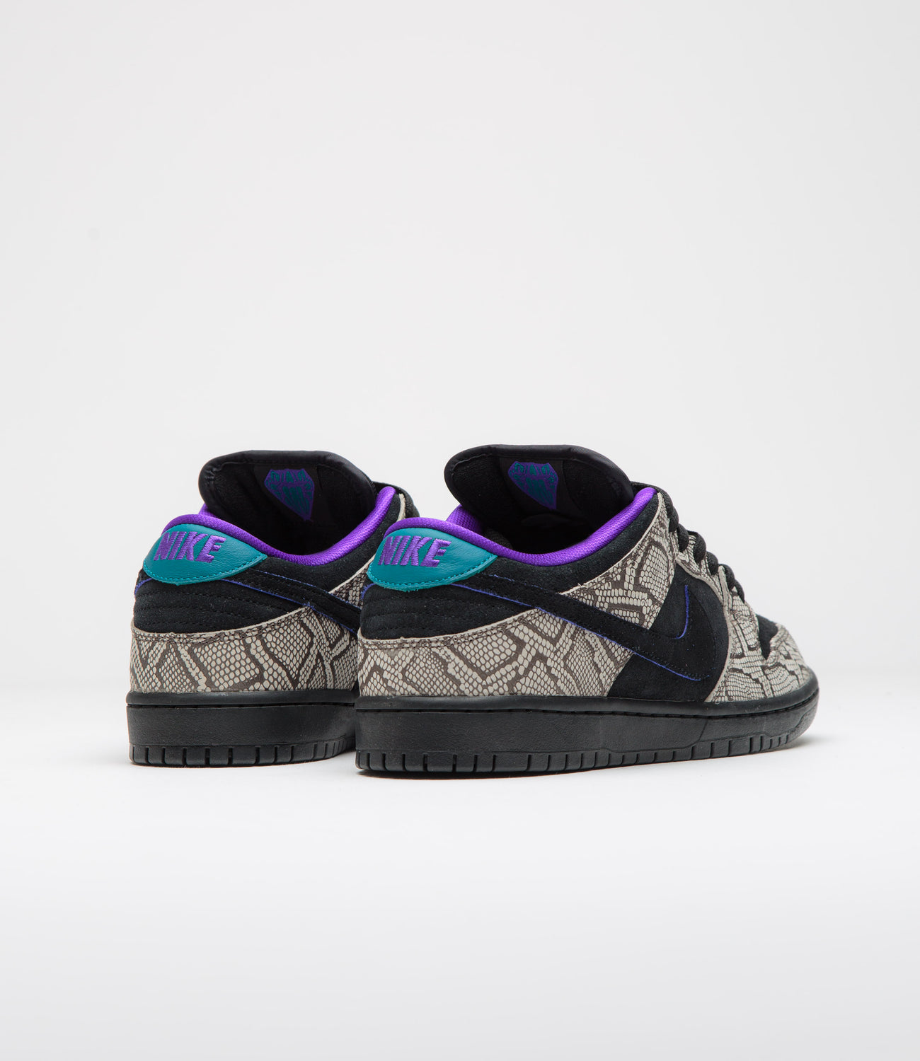 Nike SB Dunk Low Dashawn Jordan Bright Spruce heel panel showing Deep Purple Nike branding and embroidered detail