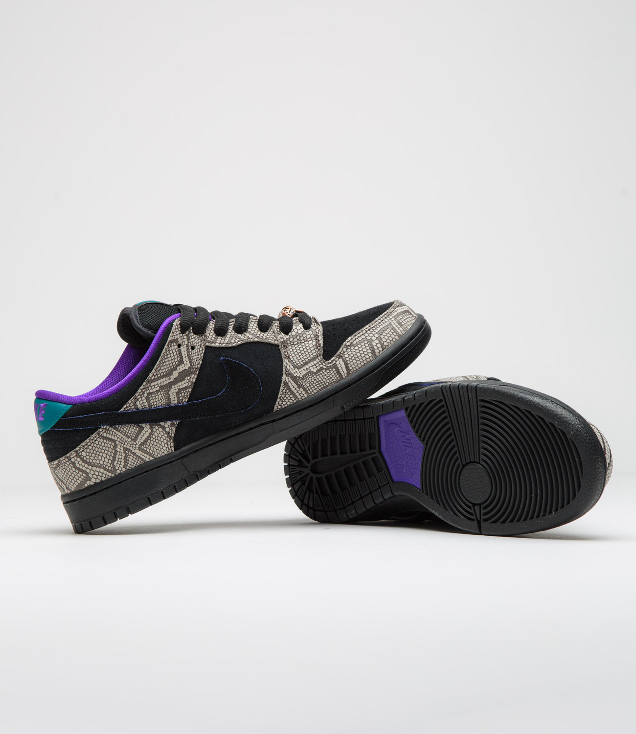 Nike SB Dunk Low Dashawn Jordan Bright Spruce tongue detail showing diamond snake tag and Turquoise SB branding