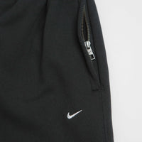 Nike Solo Swoosh Cuffed Sweatpants in Black and Black / White thumbnail