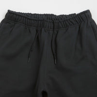 Nike Solo Swoosh Cuffed Sweatpants in Black and Black / White thumbnail