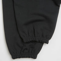 Nike Solo Swoosh Cuffed Sweatpants in Black and Black / White thumbnail