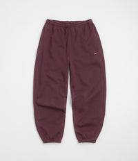Nike Solo Swoosh Cuffed Sweatpants in Burgundy Crush and Burgundy Crush / White