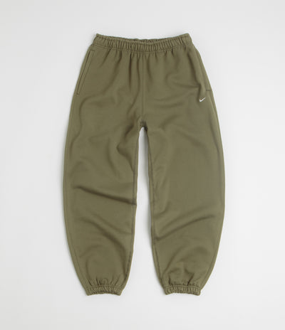 Nike Solo Swoosh Cuffed Sweatpants in Medium Olive and Medium Olive / White