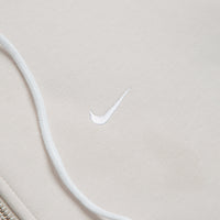 Nike Solo Swoosh Full Zip Hoodie in Light Bone and White thumbnail