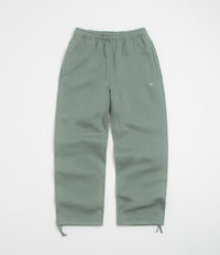 Nike Solo Swoosh Open Hem Sweatpants in Clay Green and Clay Green / White