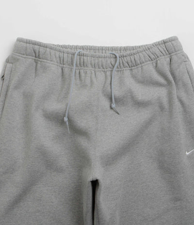 Nike Solo Swoosh Open Hem Sweatpants in Dark Grey Heather and Light Smoke Grey / White