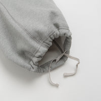 Nike Solo Swoosh Open Hem Sweatpants in Dark Grey Heather and Light Smoke Grey / White thumbnail