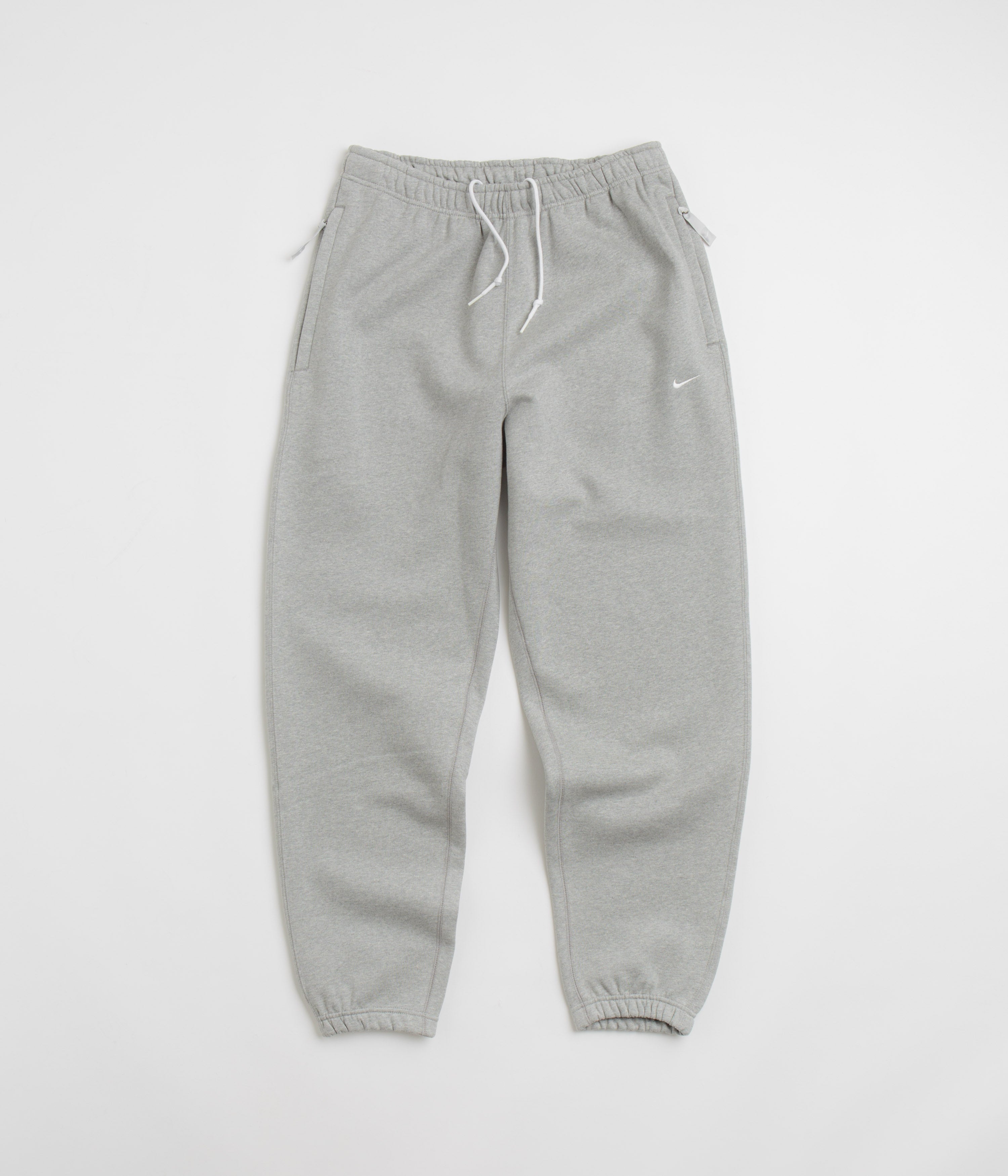 double swoosh track pants