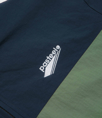 Pasteelo Hooded Windbreaker Jacket in Navy and Olive / Gold