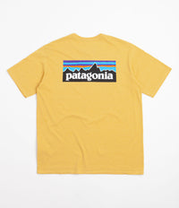 Patagonia surfboard yellow t shirt 2025