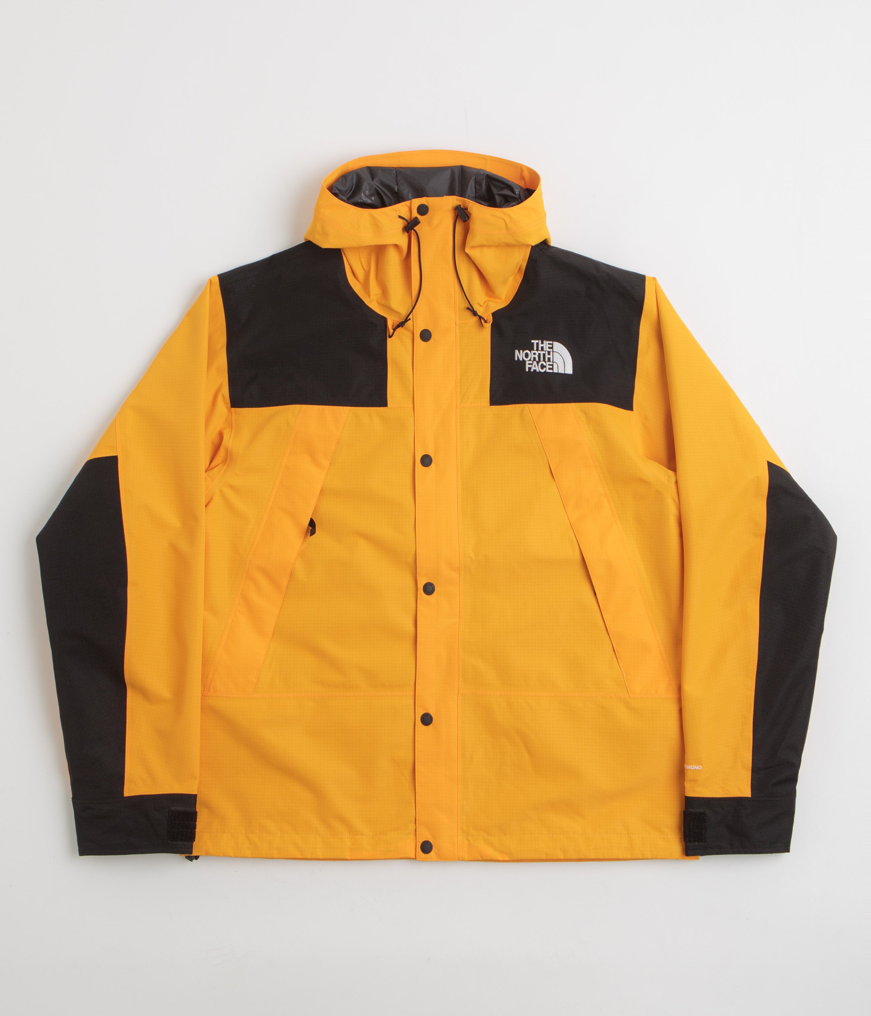The North Face Dryvent Mono Mountain Jacket in Summit Gold and TNF Black
