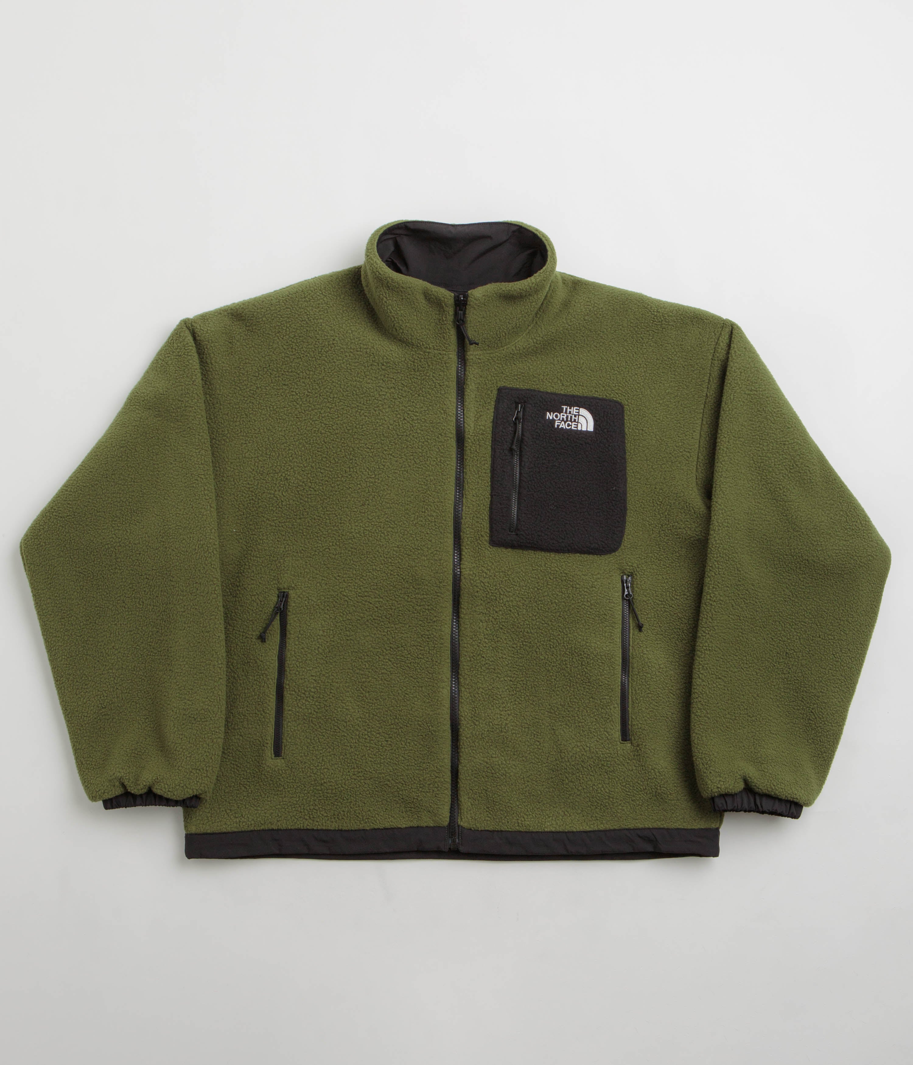 The North Face Yumiori Reversible Jacket in TNF Black and Woodland Green