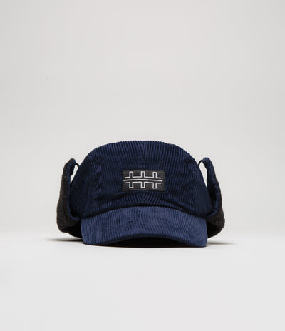 The Trilogy Tapes Cord Earflap Cap in Navy