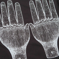 The Trilogy Tapes Face Figures Hands T-Shirt in Black thumbnail