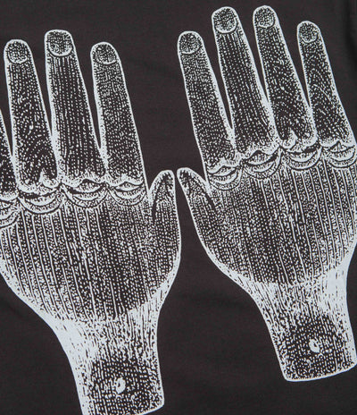 The Trilogy Tapes Face Figures Hands T-Shirt in Black