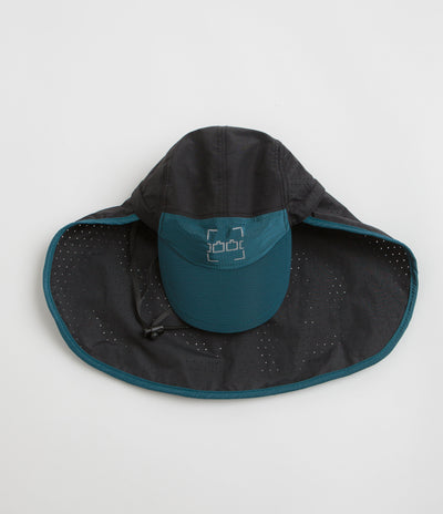 The Trilogy Tapes Neck Cape Trail Cap in Blue and Black