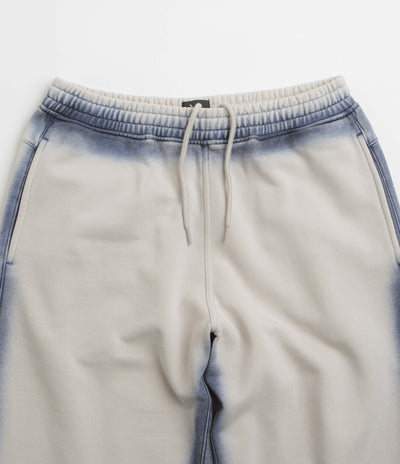 The Trilogy Tapes Overdye Open Hem Sweatpants in Grey and Blue