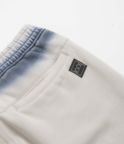 The Trilogy Tapes Overdye Open Hem Sweatpants in Grey and Blue