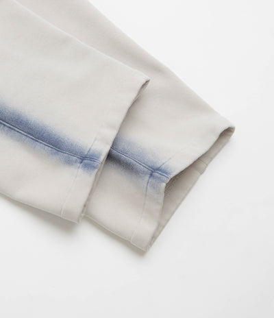 The Trilogy Tapes Overdye Open Hem Sweatpants in Grey and Blue