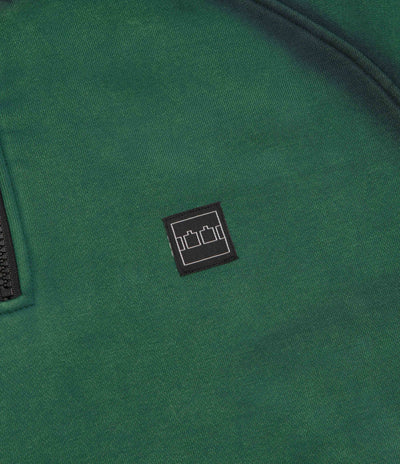 The Trilogy Tapes Spray Funnel Neck Jacket in Sea Moss Green and Back