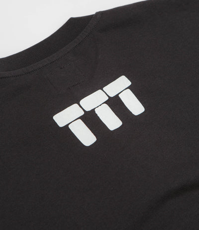 The Trilogy Tapes Tetris Teeth T-Shirt in Black and Glow In The Dark