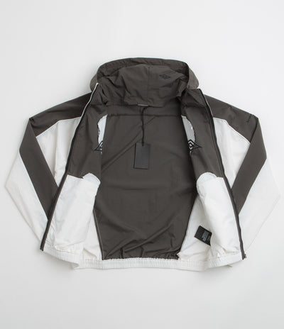 Umbro Guarding Masked Tracksuit Jacket in White and Dark Olive
