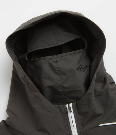 Umbro Guarding Masked Tracksuit Jacket in White and Dark Olive