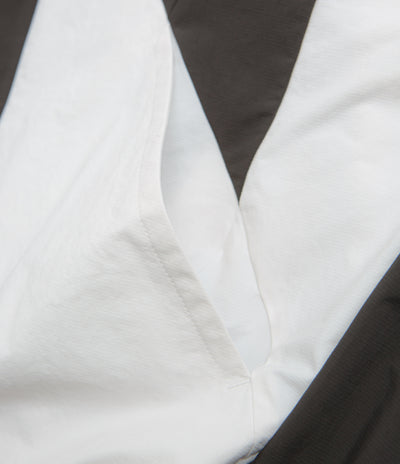 Umbro Guarding Masked Tracksuit Jacket in White and Dark Olive