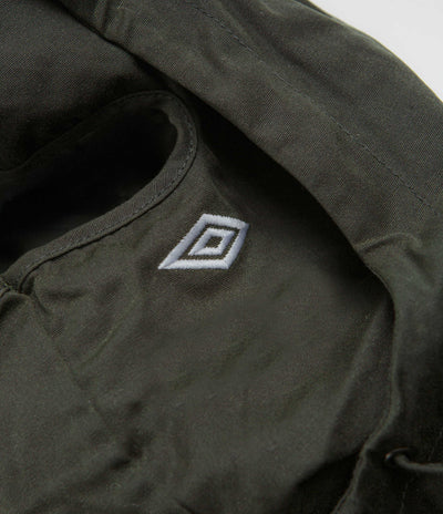 Umbro Masked Waxed Anorak in Dark Olive