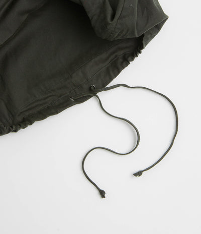 Umbro Masked Waxed Anorak in Dark Olive