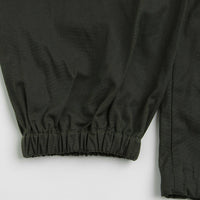 Umbro Masked Waxed Anorak in Dark Olive thumbnail