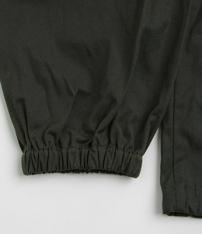 Umbro Masked Waxed Anorak in Dark Olive