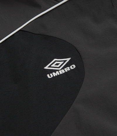 Umbro Rose Crest Masked Track Jacket in Black and Dark Gray