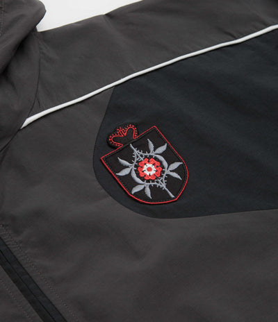 Umbro Rose Crest Masked Track Jacket in Black and Dark Gray