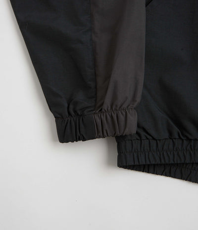 Umbro Rose Crest Masked Track Jacket in Black and Dark Gray