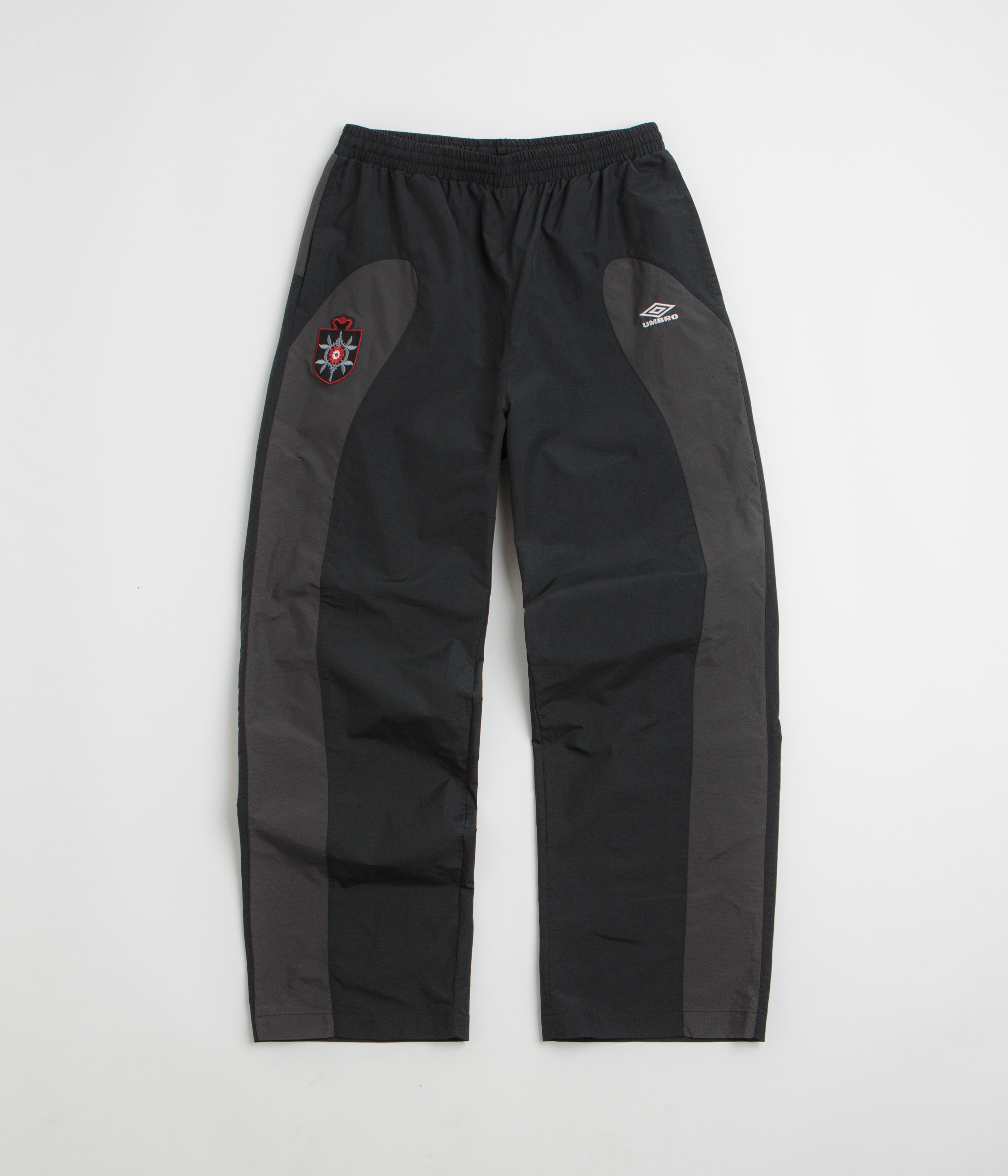 Umbro Rose Crest Track Pants in Black and Dark Gray