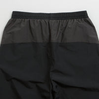 Umbro Rose Crest Track Pants in Black and Dark Gray thumbnail