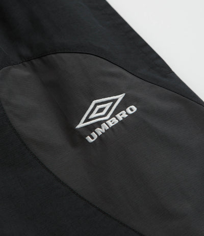 Umbro Rose Crest Track Pants in Black and Dark Gray