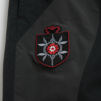 Umbro Rose Crest Track Pants in Black and Dark Gray thumbnail